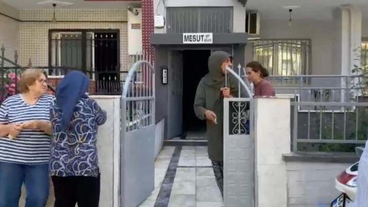 Cinayet zanlısı koca adliyeye sevk edilirken.