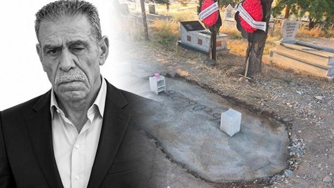 Mehmet Ali Enhas'ın mezarı başında ailesi ve yakınları