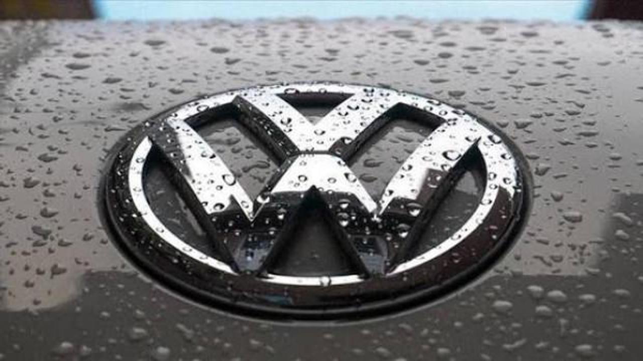 Volkswagen logosu ve fabrika görüntüsü