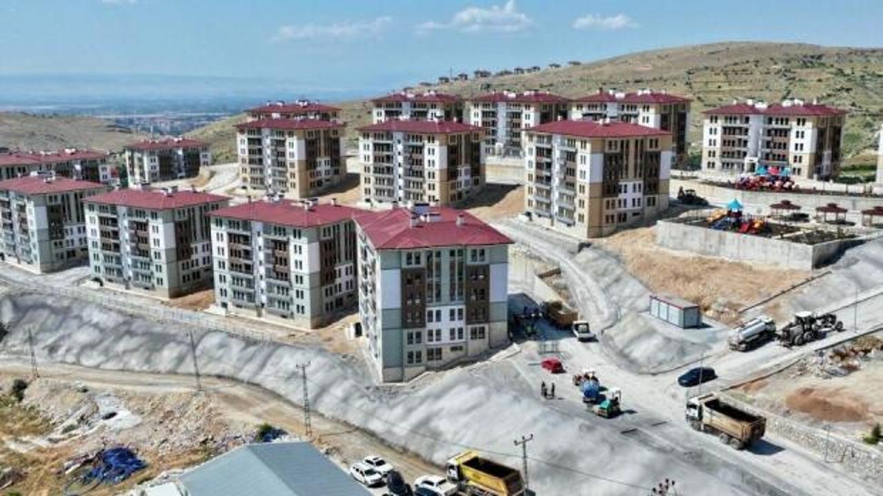 TOKİ logosu ve uyarı işareti.