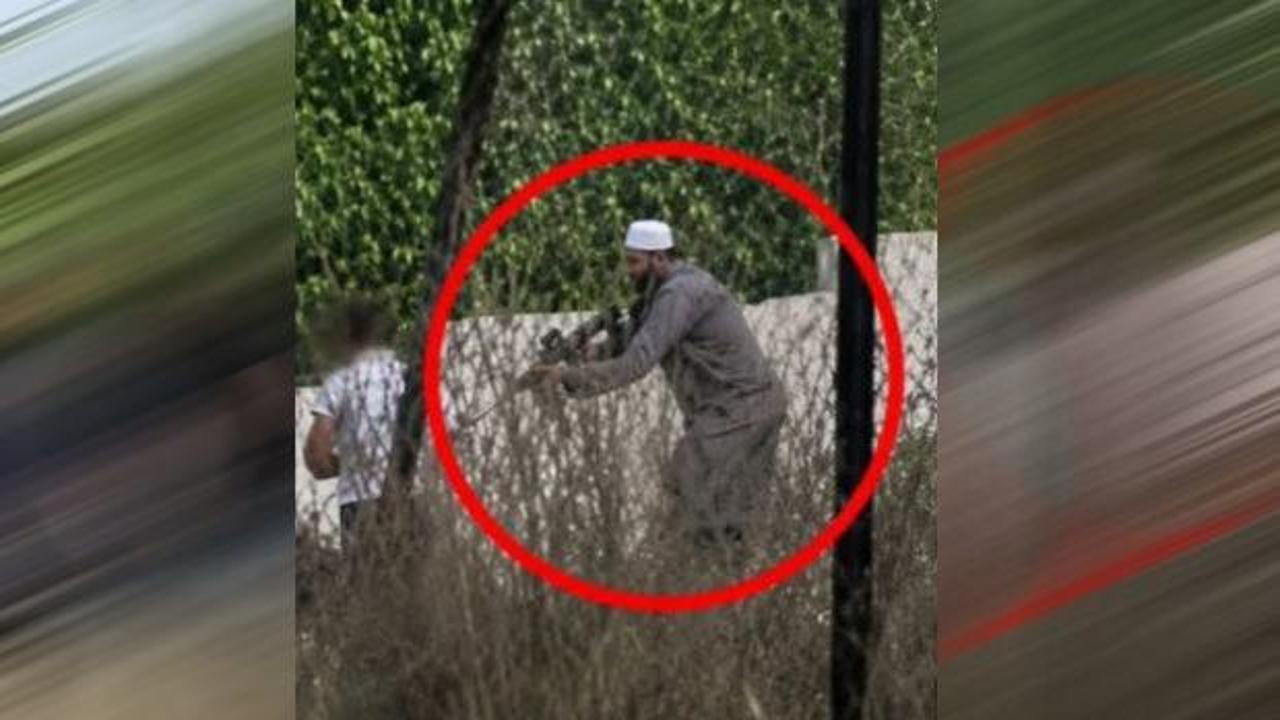 Batı Şeria'da yaşanan bir olayda, bir Filistinli Müslümanın İsrailli bir güvenlik görevlisinden aldığı silahla kendini savunduğu anı gösteren temsili görsel.