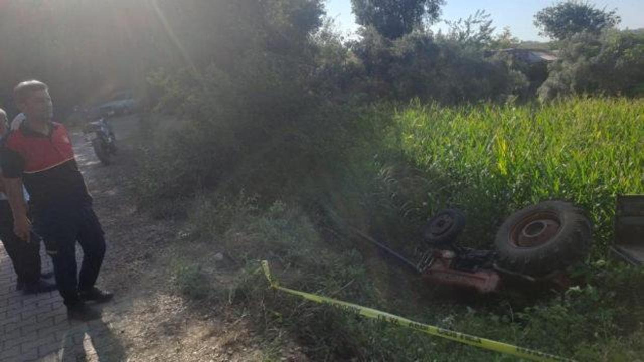 Osmaniye'de devrilen traktörden yaralıların çıkarılması