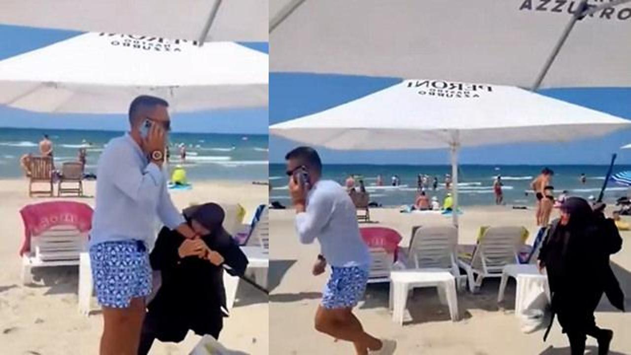 Sahilde yaşlı bir kadın ile plaj görevlisi arasında yaşanan tartışma anı.