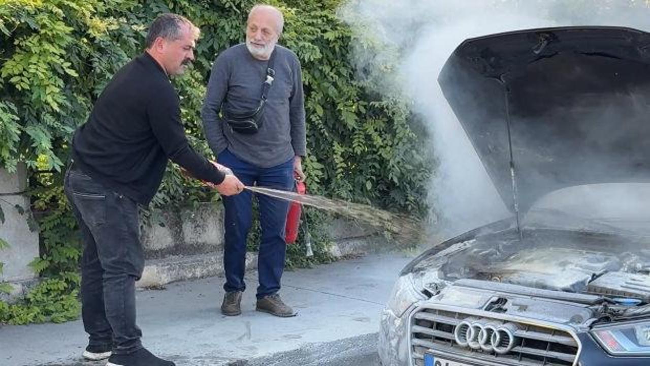 Kağıthane&rsquo;de otomobil alev alev yandı! Kola şişesiyle m&uuml;dahale ettiler