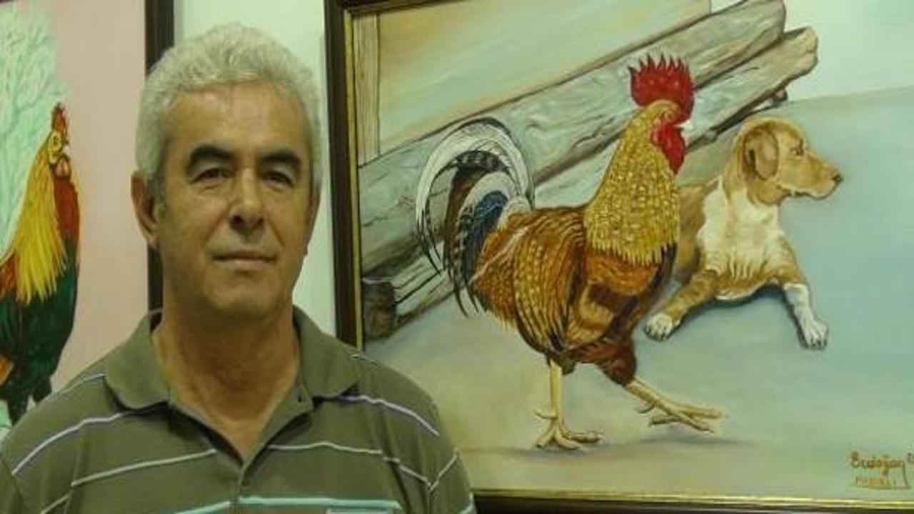 Altın tozuyla horoz resmi yaptı