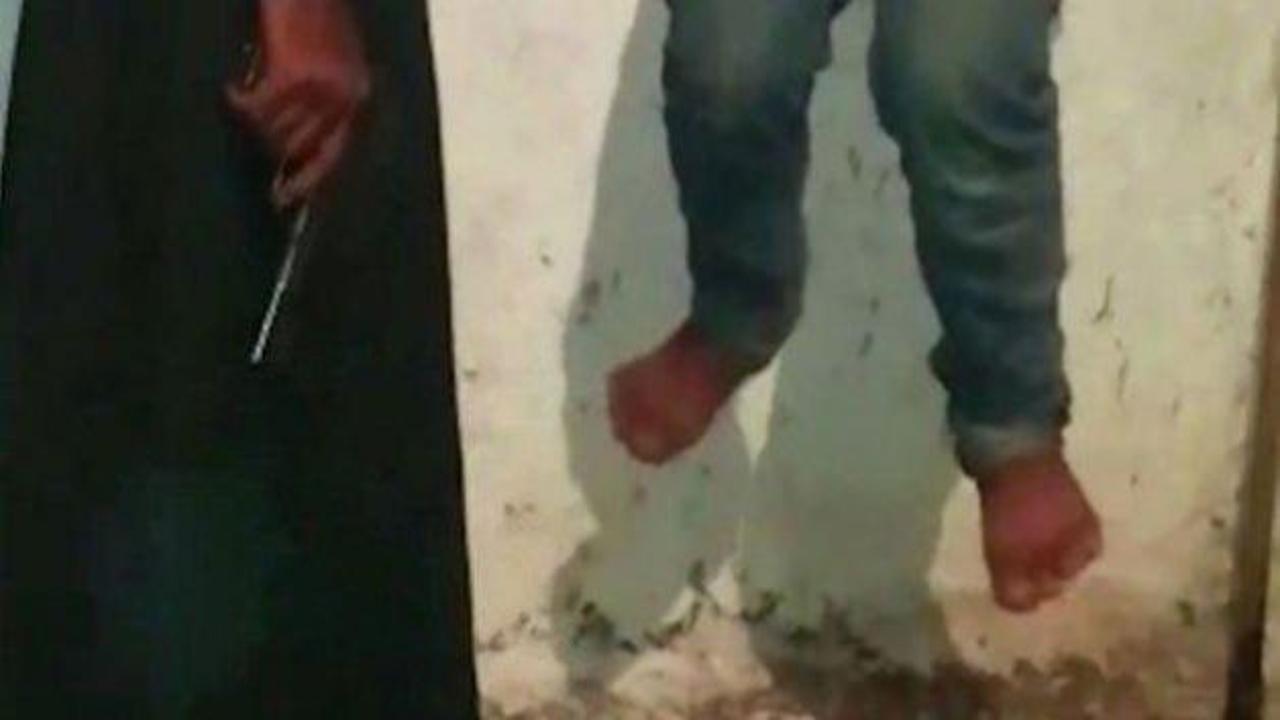 IŞİD'in 14 yaşındaki &ccedil;ocuğa işkence g&ouml;r&uuml;nt&uuml;leri