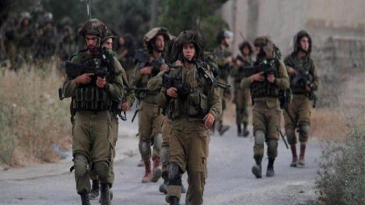 İsrail askerleri, 12 Filistinliyi gözaltına aldı