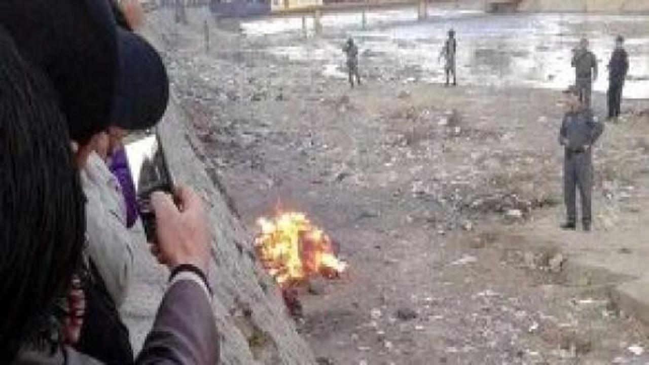 Kuran'ı yakan kadın linç edip yaktılar