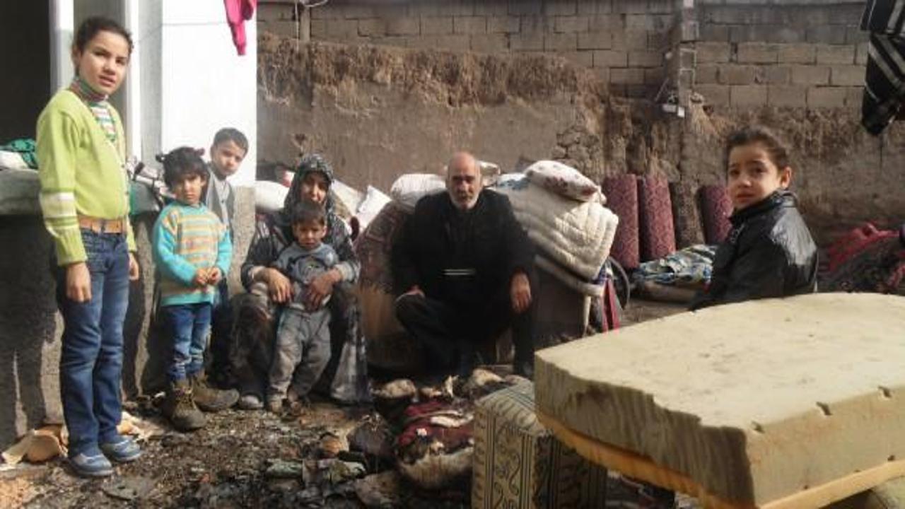 Evleri kül olan Suriyeli aile sokakta kaldı