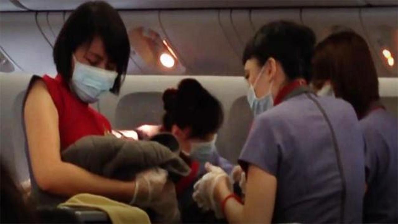 Uçakta doğum yapan kadına tazminat davası