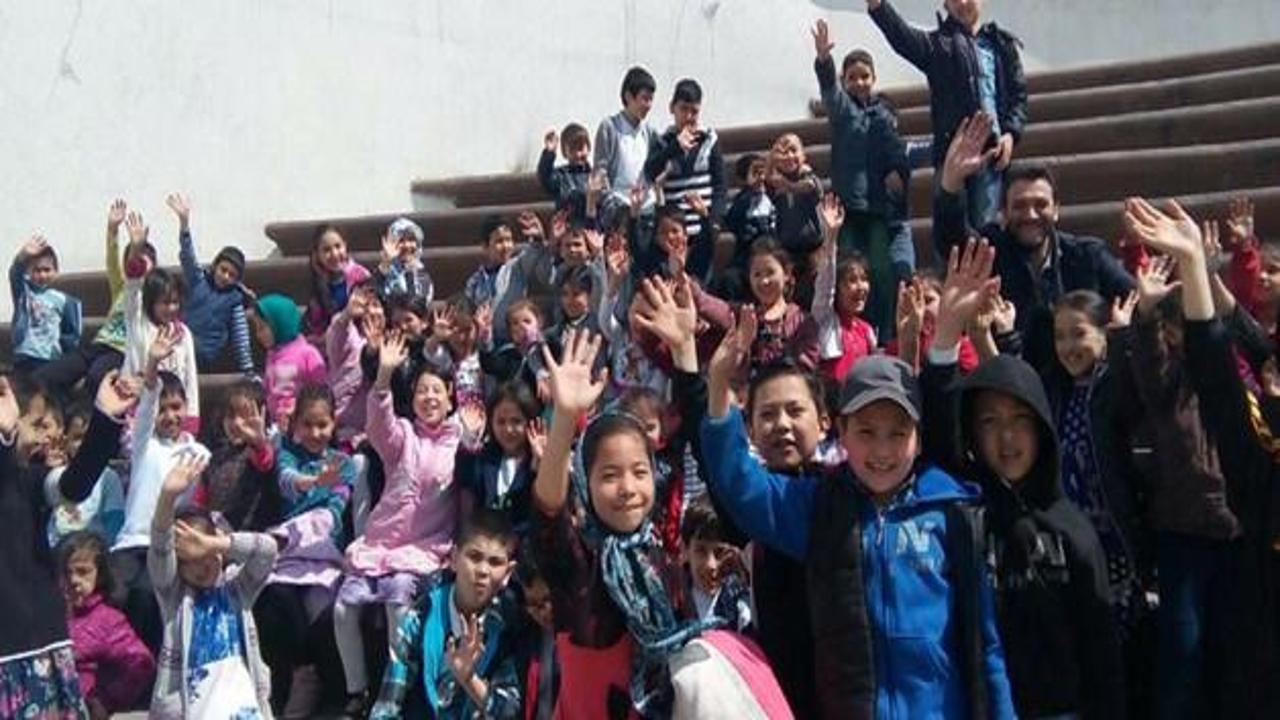 YESİ derneğinden Türkistanlı öğrencilere karne