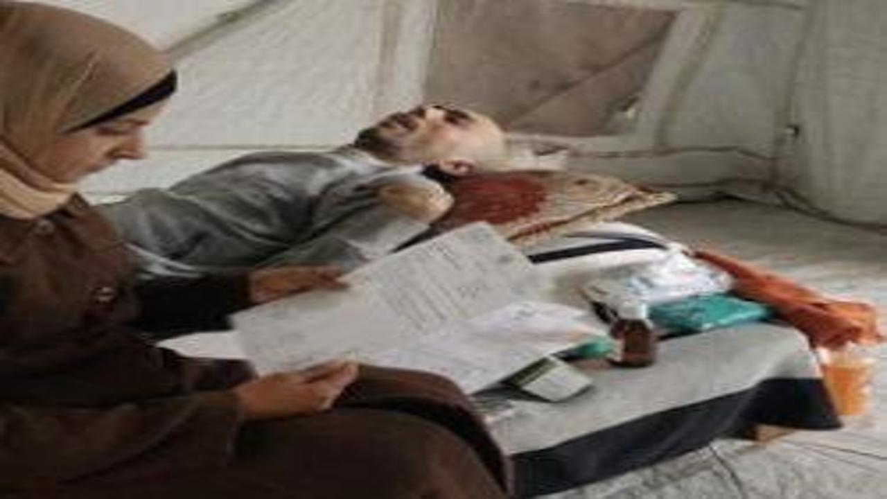 Gazze'de başından vurularak felç olan Raid, acılar içinde kıvranıyor