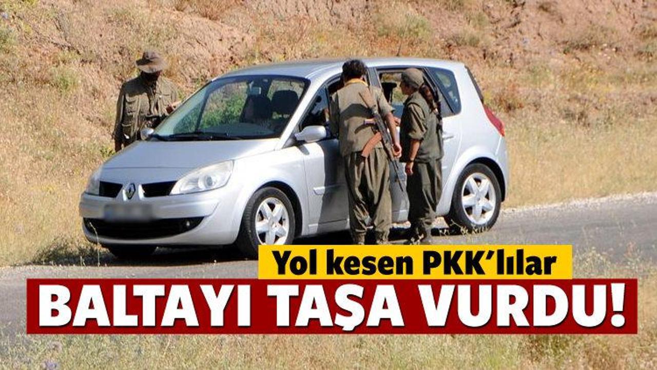 Yol kesen PKK'lılar baltayı taşa vurdu