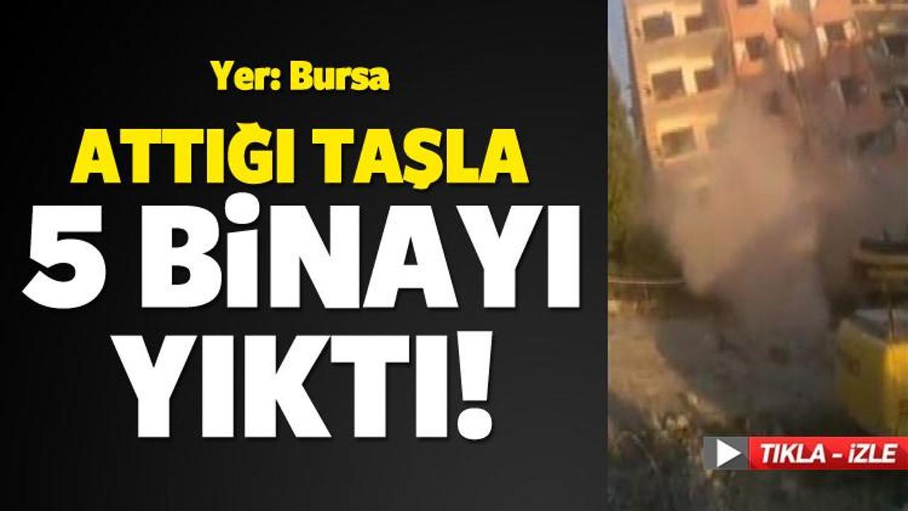 Attığı taşla 5 katlı binayı yıktı!