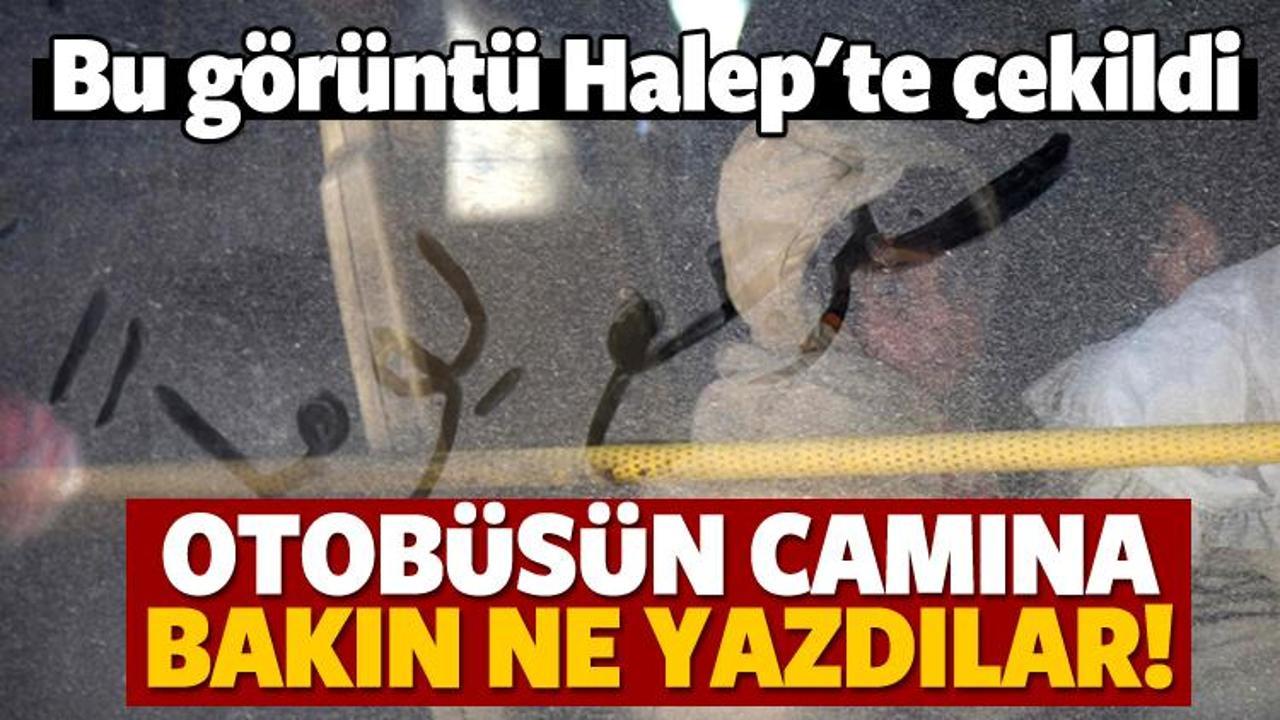 Halep'te otob&uuml;s&uuml;n camına bakın ne yazdılar!
