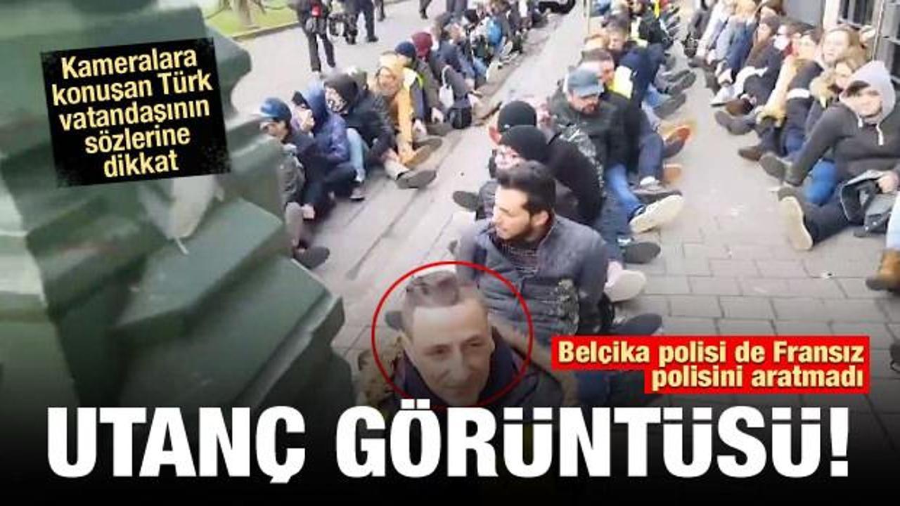 Belçika polisinden göstericilere ters kelepçe