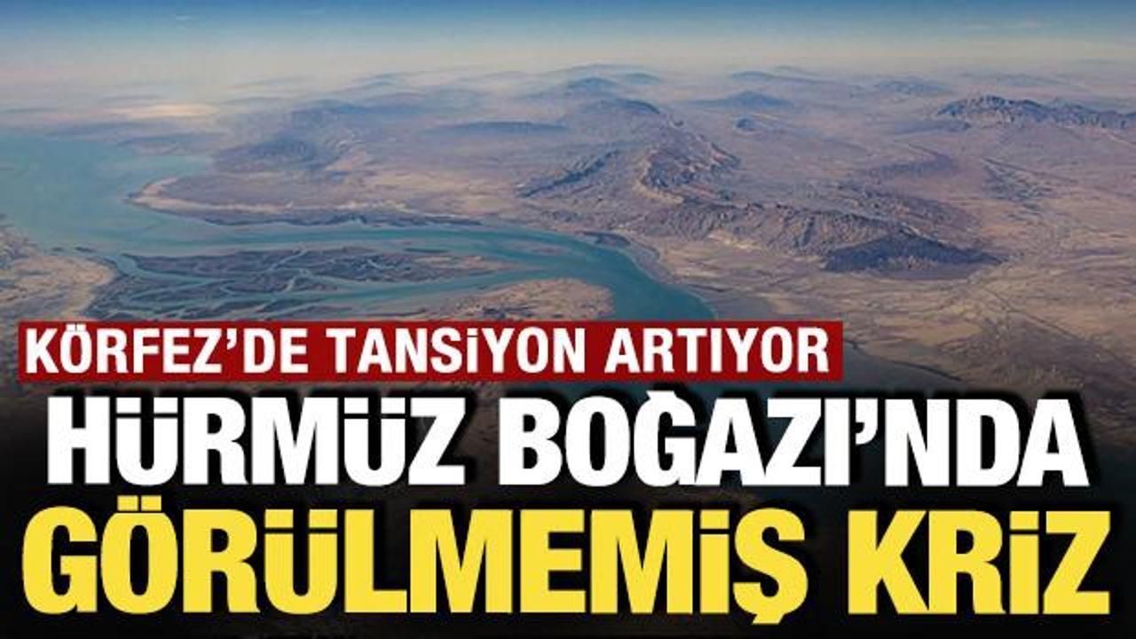 Hürmüz Boğazı'nda askeri gemiler ve ticari tankerler.