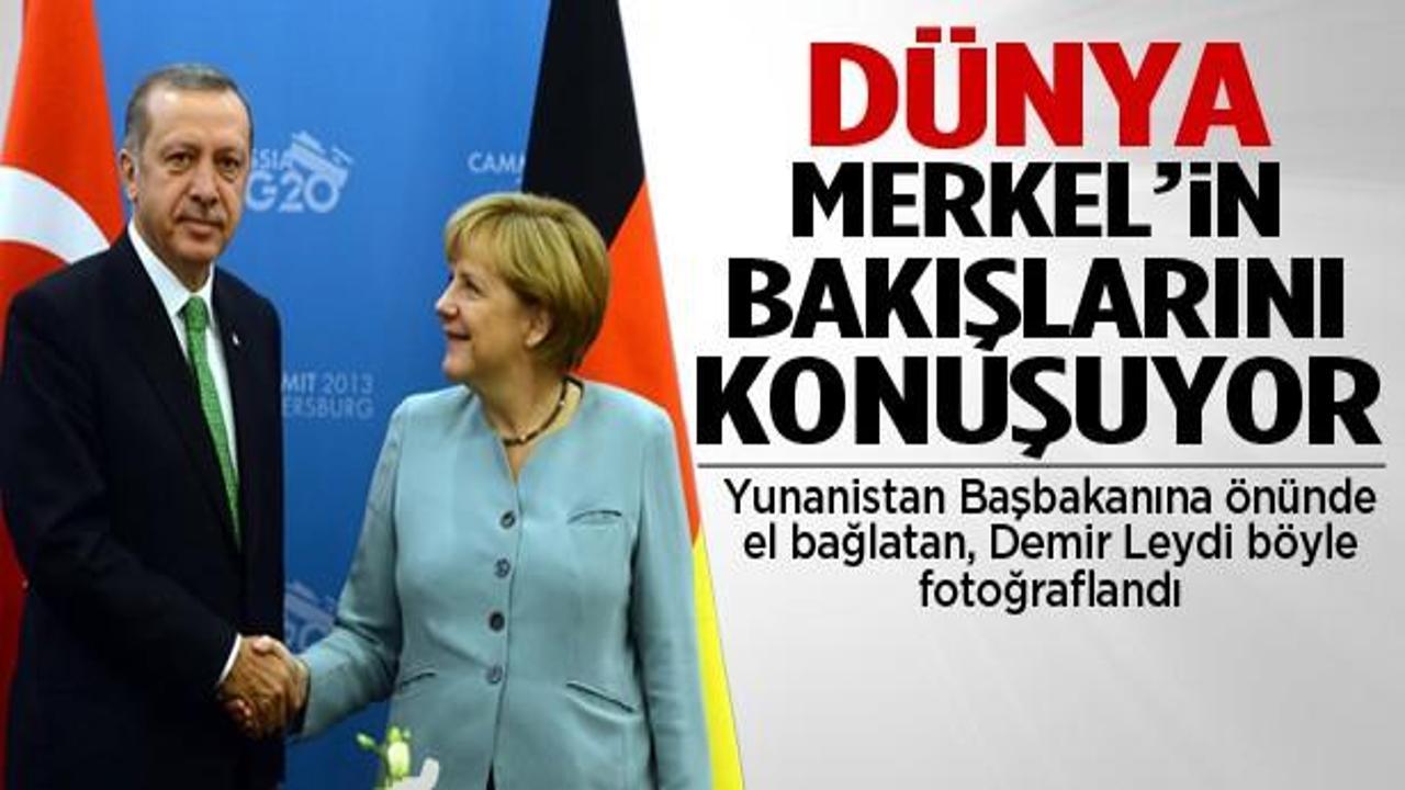Dünya Merkel'in bakışlarını konuşuyor