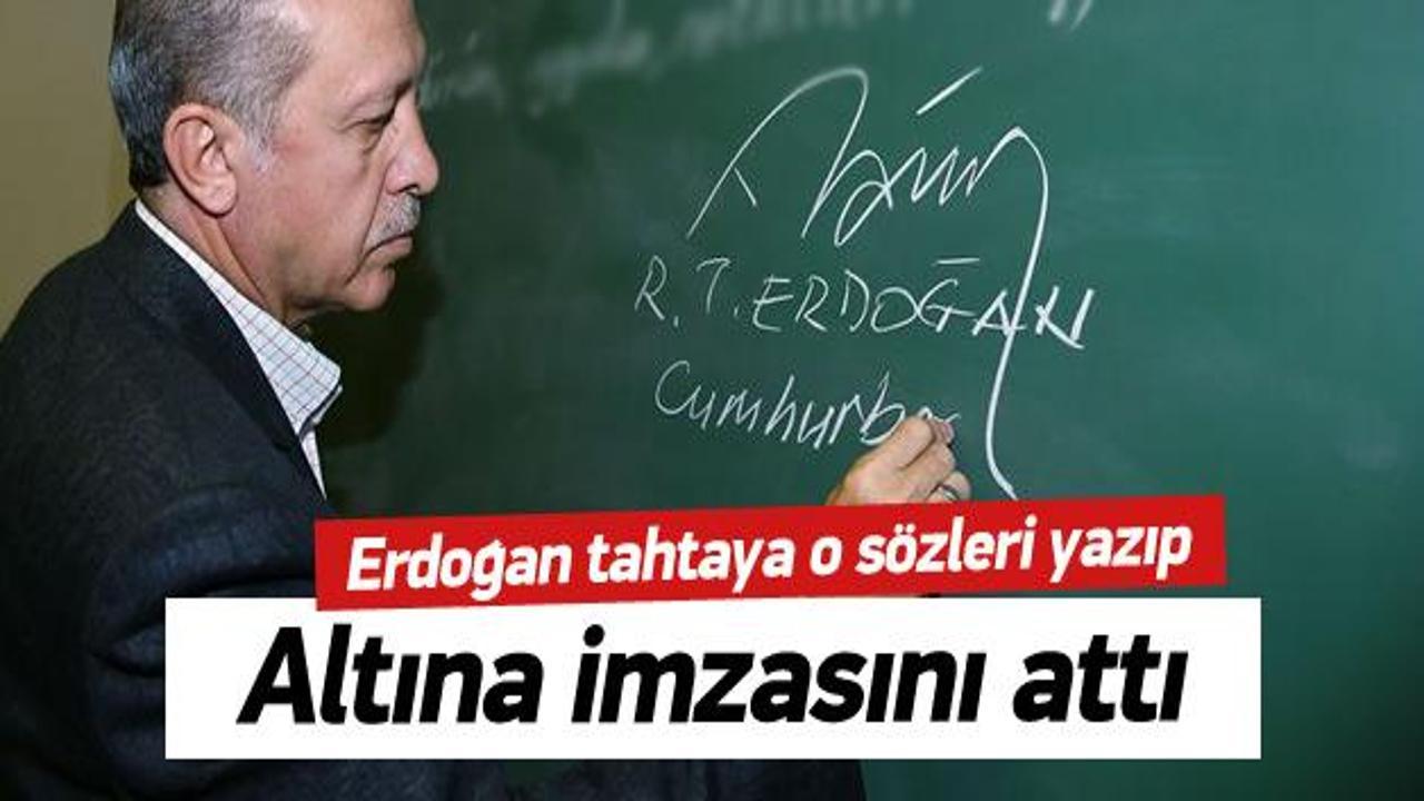Erdoğan tahtaya yazıp altına imzasını attı