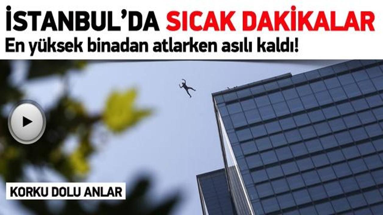Paraş&uuml;t&uuml;yle en y&uuml;ksek binada asılı kaldı