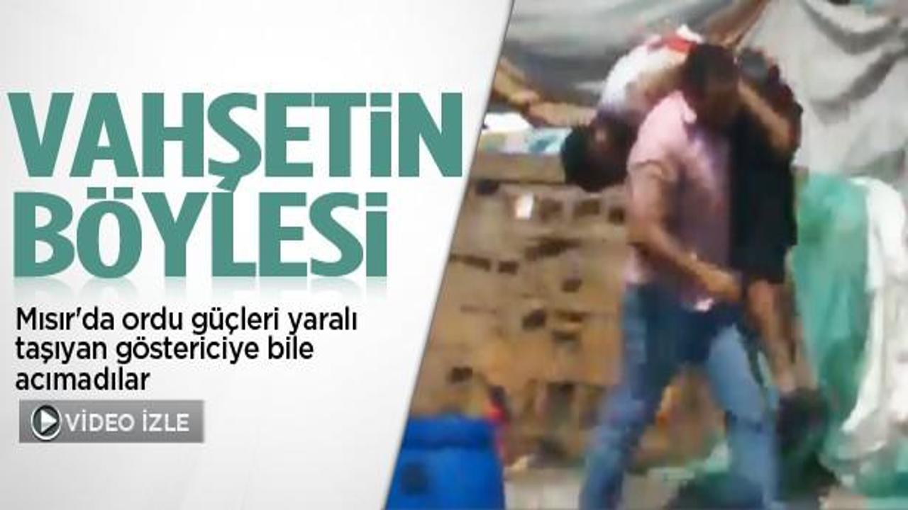 Yaralı taşıyan göstericiye bile acımadılar