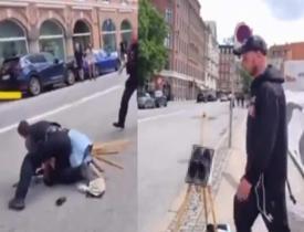 Danimarka'da Kur'an-ı Kerim'in yakılmasına izin vermek istemeyen kadına polisten şiddet!