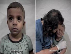 İsrail'in saldırısında korkudan titreyen Filistinli çocuğu doktor böyle sakinleştirmeye çalıştı