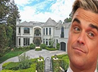 Robbie Williams evinin kapılarını ilk kez açtı