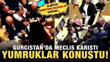 G&uuml;rcistan parlamentosu karıştı vekiller birbirine yumrukla saldırdı