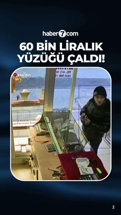 Mardin'de bir kişi, m&uuml;şteri kılığında girdiği kuyumcudan fotoğraf &ccedil;ekme bahanesiyle eline aldığı 60 bin liralık y&uuml;z&uuml;ğ&uuml; &ccedil;alıp ka&ccedil;tı.