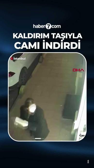 Kaldırım taşıyla d&uuml;kkanın camını indirdi!