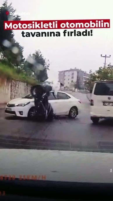 Otomobilin tavanına fırladı!