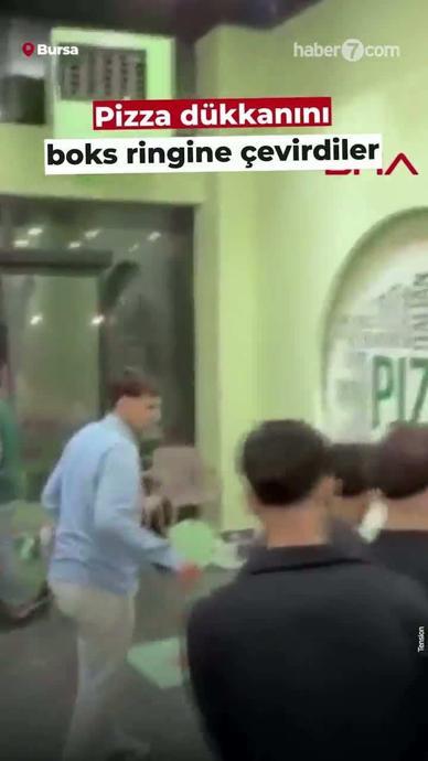 Burası boks ringi değil bir pizzacı!